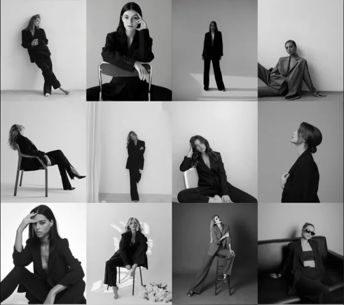 Fotógrafo orientando cliente sobre poses durante sessão em estúdio com iluminação cinematográfica suave